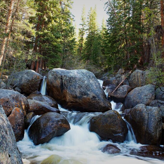 A,Beautiful,Landscape,Of,Mountain,Stream,With,Boulders,In,The
