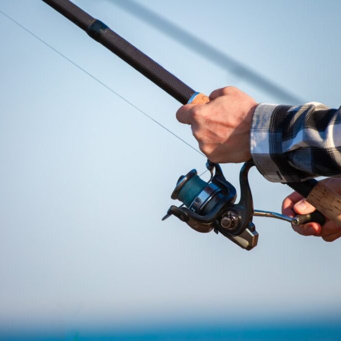 Close-up,Of,Fishing,Rod,Reels.,Fishing,On,The,Shore,Of