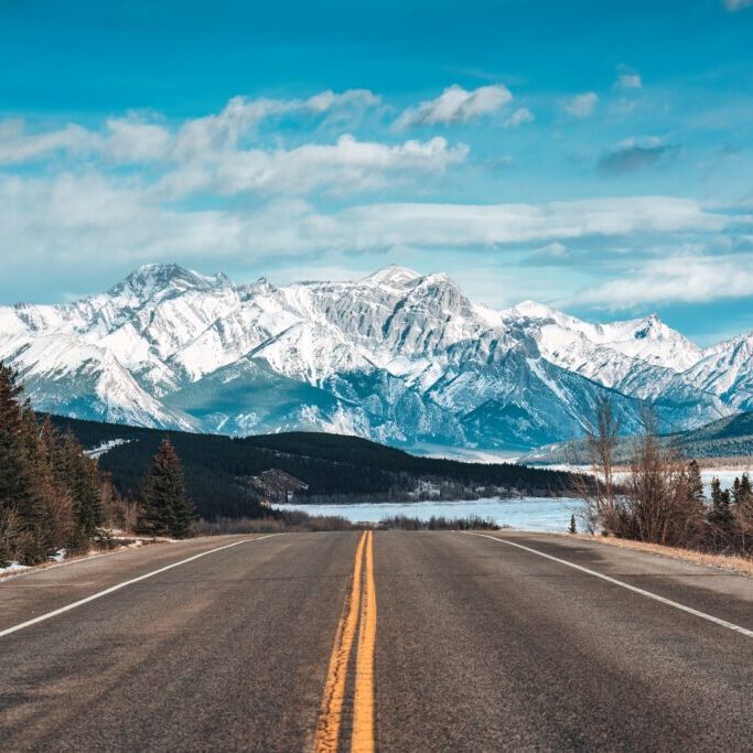 Road,Trip,With,Car,Driving,On,Highway,Road,With,Snow