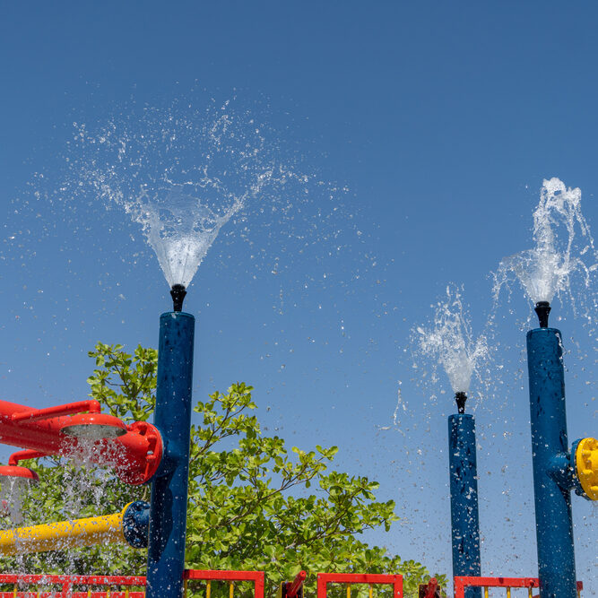 Three,Blue,Spray,Water,Park,Sprinklers,Spraying,Water,Above,For