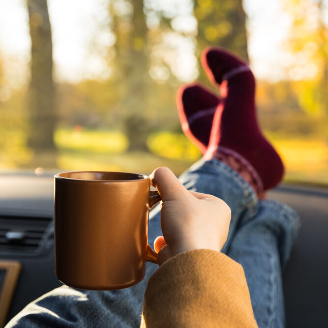 Autumn,Car,Trip.,Woman,Feet,In,Warm,Wool,Socks,And