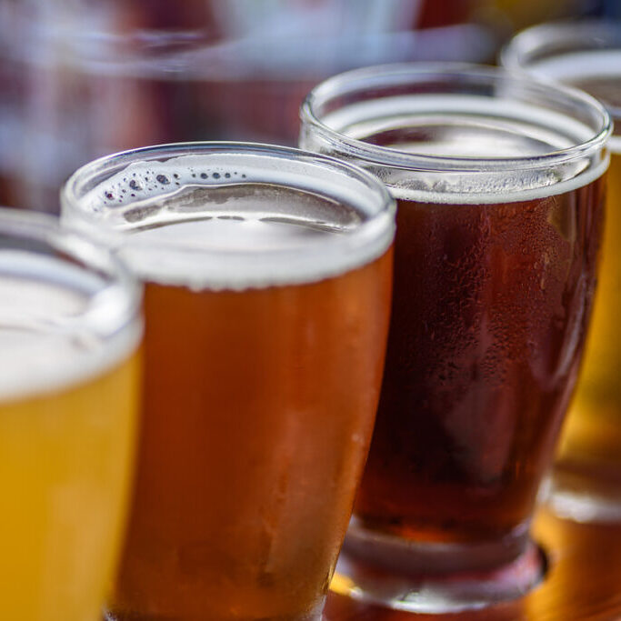 Beautiful colorful beer sample glasses at microbrewery