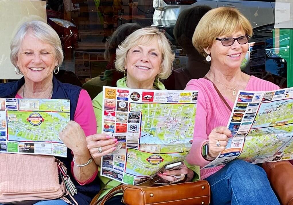 ladies looking at maps