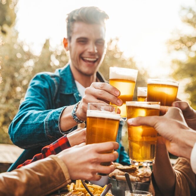 Group,Of,Multi,Ethnic,Friends,Having,Backyard,Dinner,Party,Together